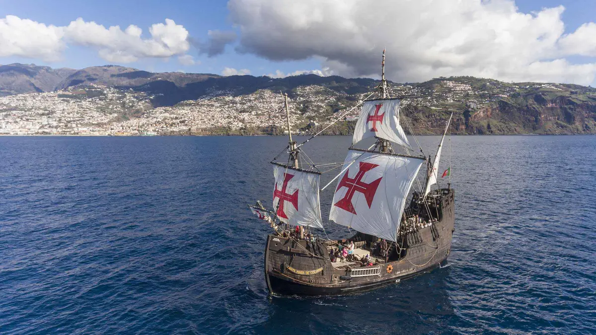 The wooden replica galleon Santa Maria de Colombo sailing along the Funchal coastline on a Flag Ship Tour in Funchal, Portugal