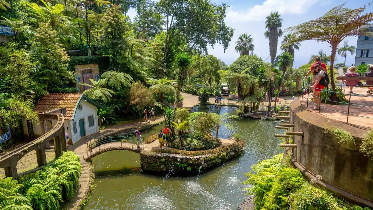 A tuk-tuk parked by the gardens of Monte on a Monte Palace and old town tour from Funchal, Portugal