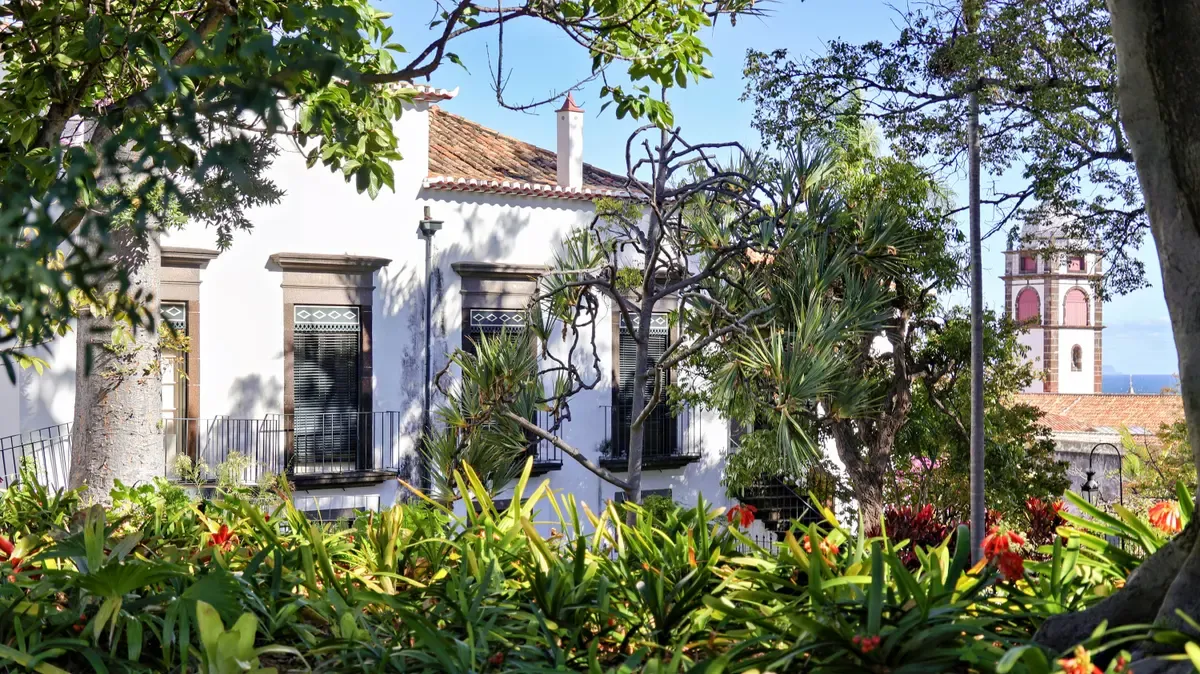 The white manor house and subtropical garden of the Quinta das Cruzes Museum in Funchal, Madeira, Portugal