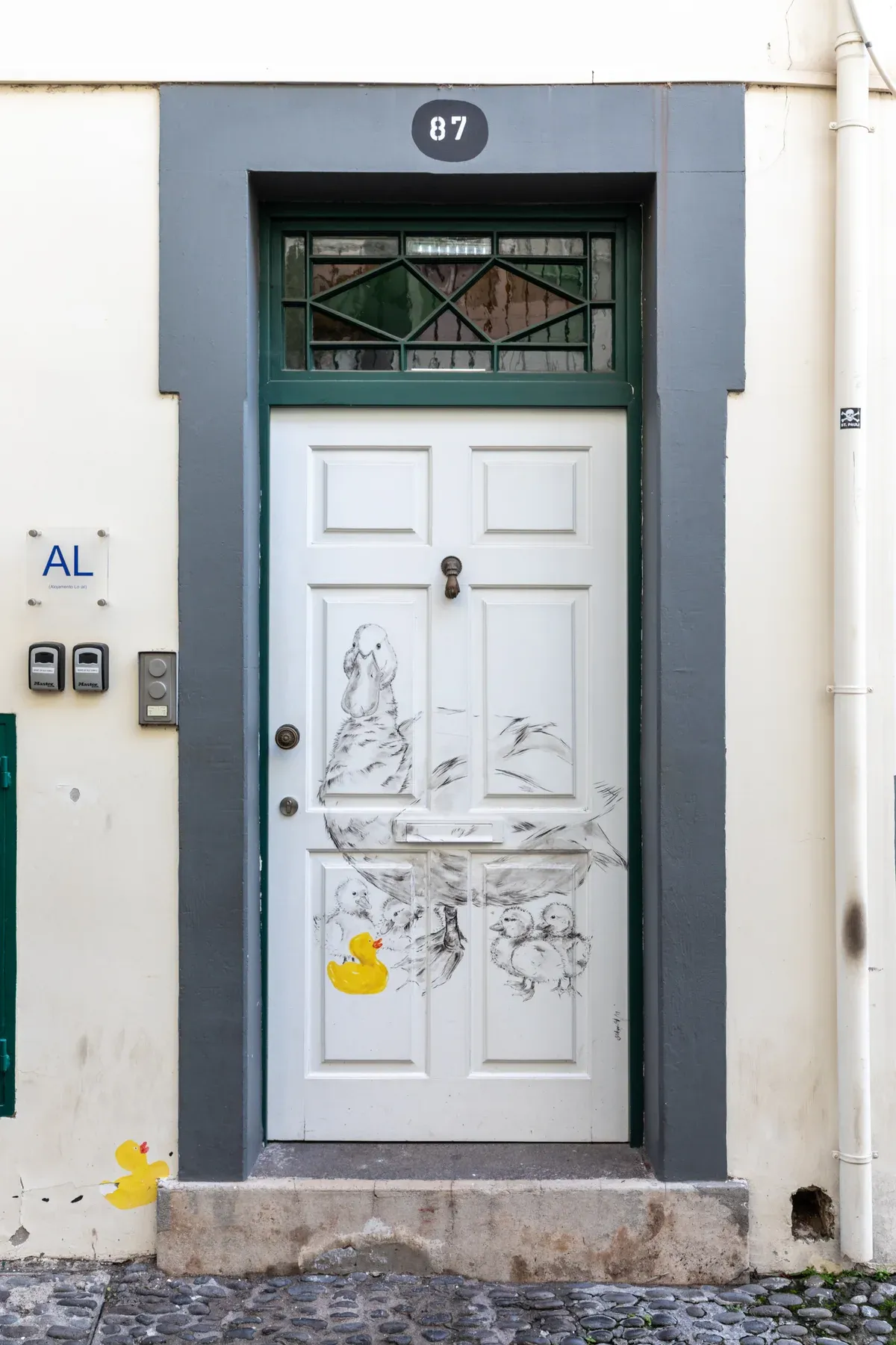 A painted door on Rua de Santa Maria in Funchal's Old Town, part of a self-guided walk in Madeira