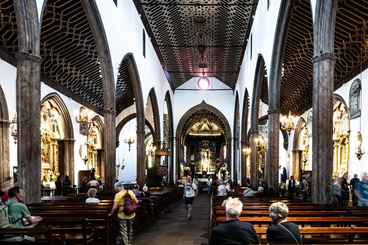 The nave and carved Mudéjar cedar ceiling of the Sé cathedral in Funchal, Portugal